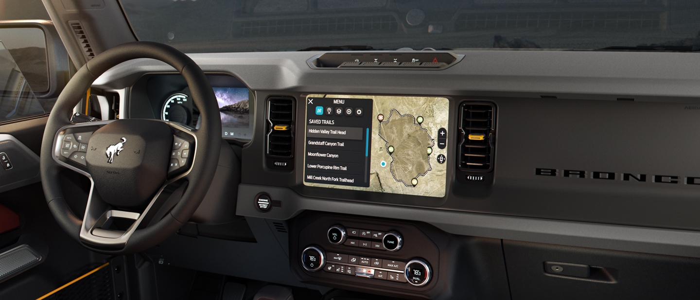 Interior of the 2021 Ford Bronco with mountain landscape through windows